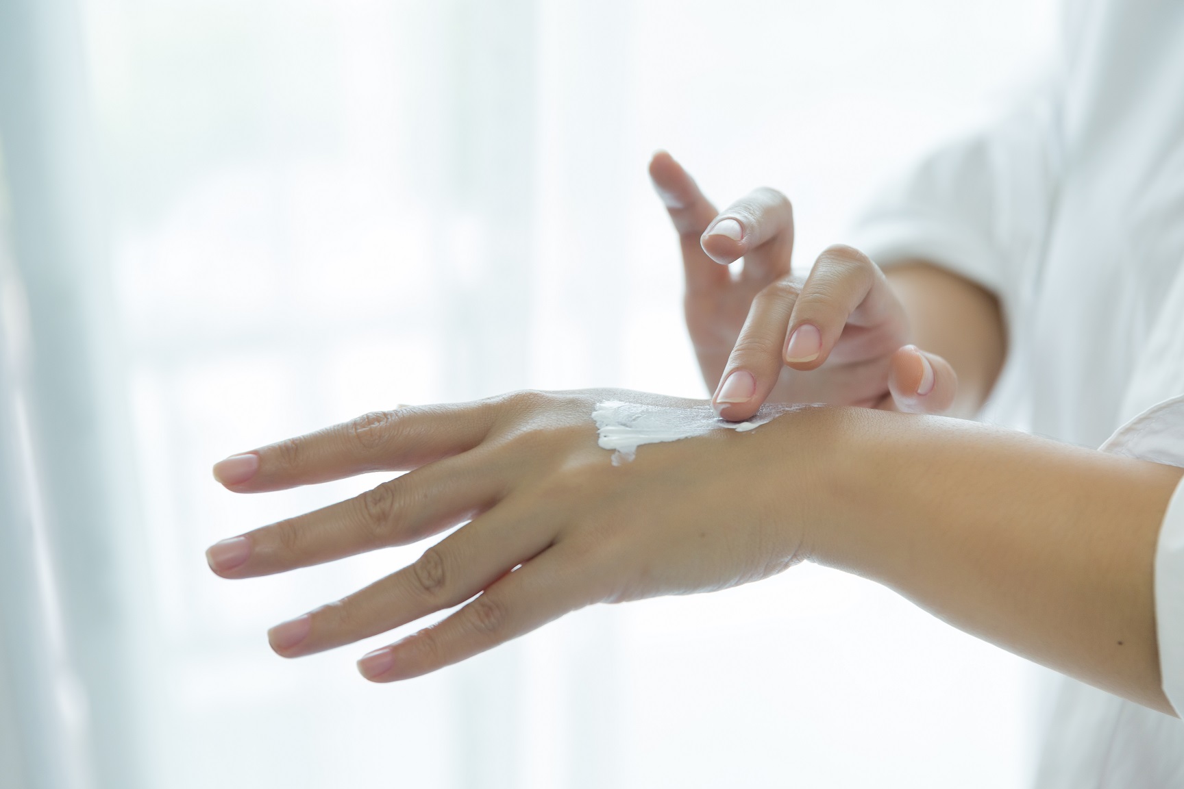 Skincare. Woman taking care of her dry complexion.